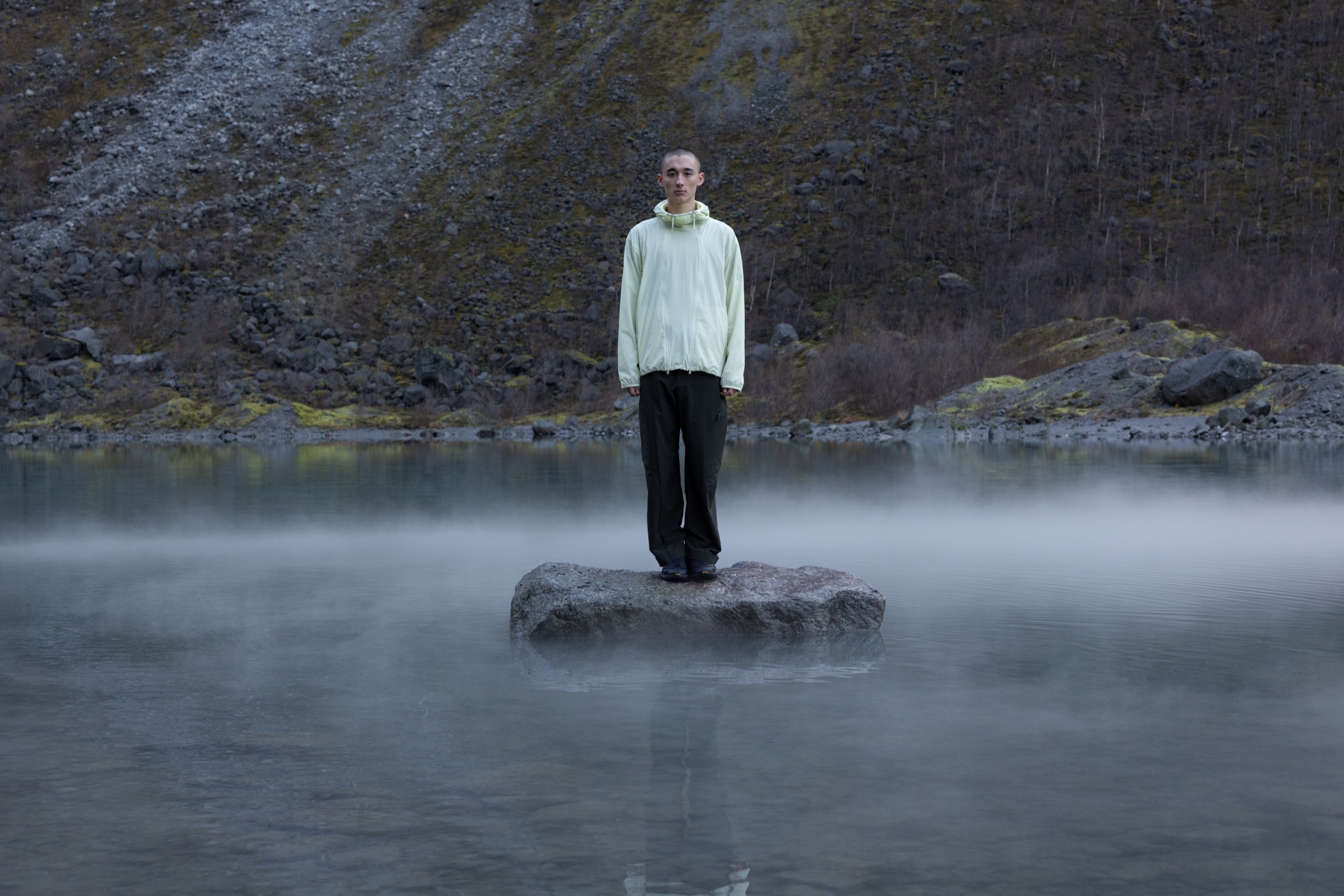 Outdoor performance study beside a mountain lake